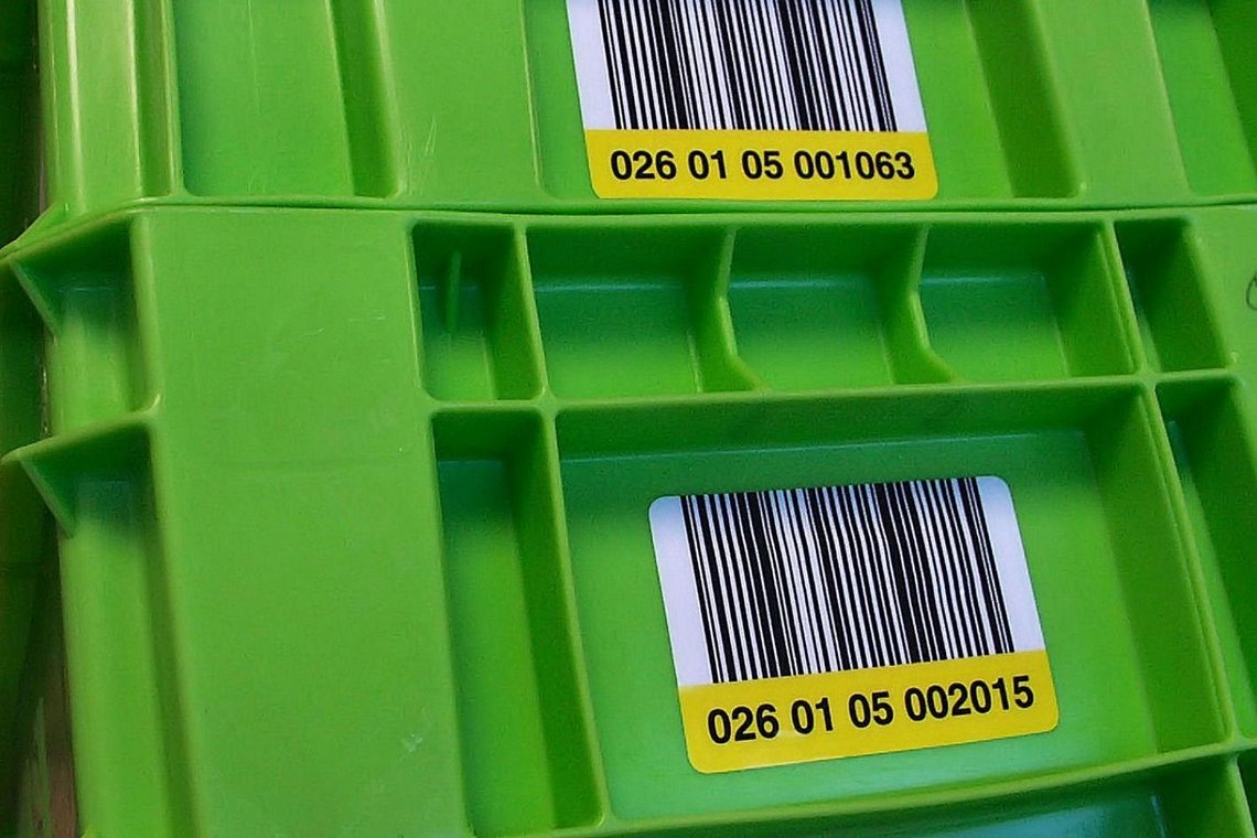 inotec Photo of Barcode Etikett Behälter grün